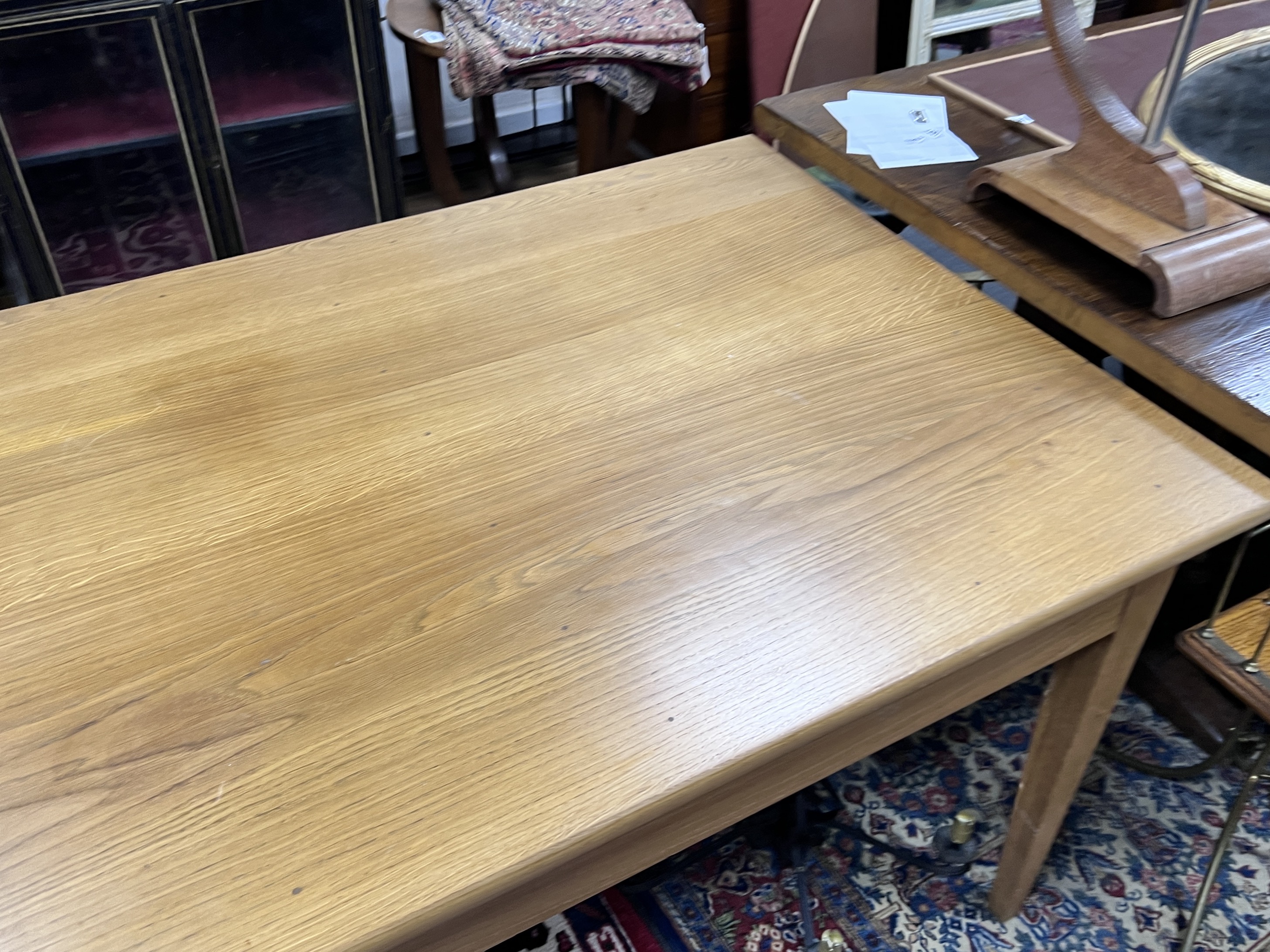 A contemporary oak refectory style dining table, length 200cm, width 89cm, height 72cm